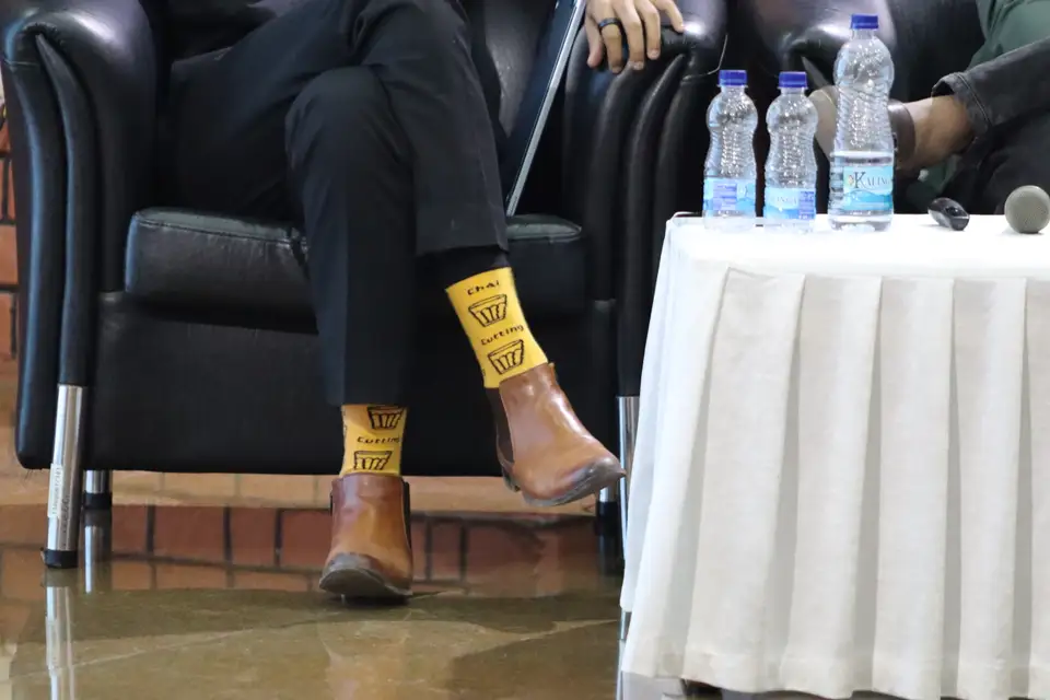 Yellow patterned socks and brown boots